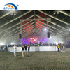 Curved style temporary stadium tent for concert or sports court