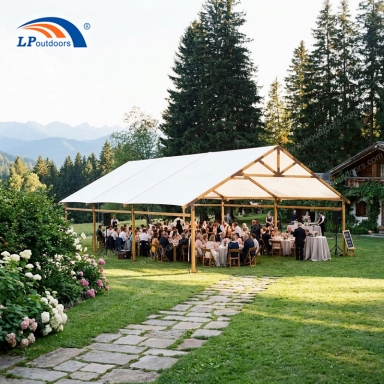 LP OUTDOORS faux timber marquee tent at an outdoor wedding.png