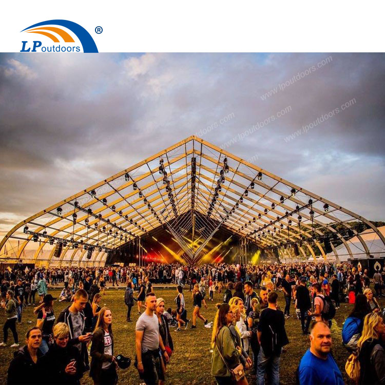 Curved style temporary stadium tent for concert or sports court