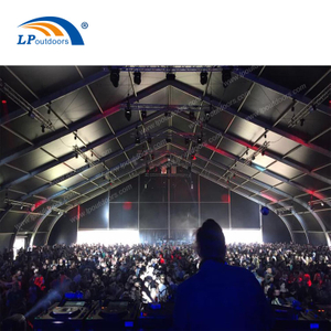 Curved style temporary stadium tent for concert or sports court